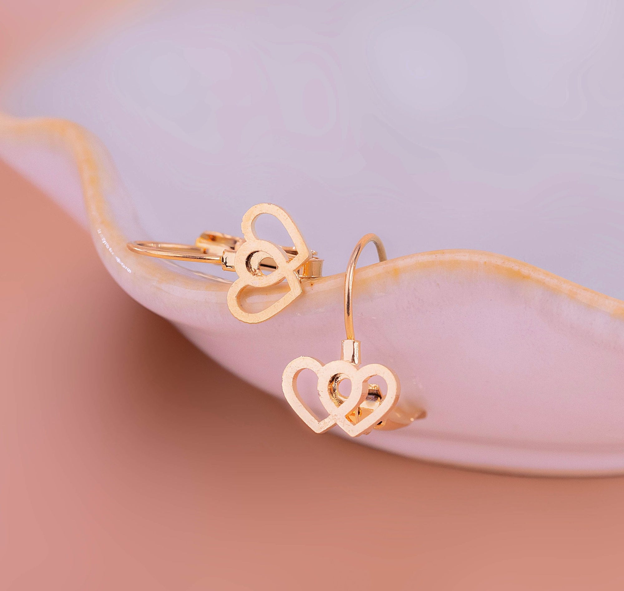 ARETES CORAZONES DOBLES DORADOS